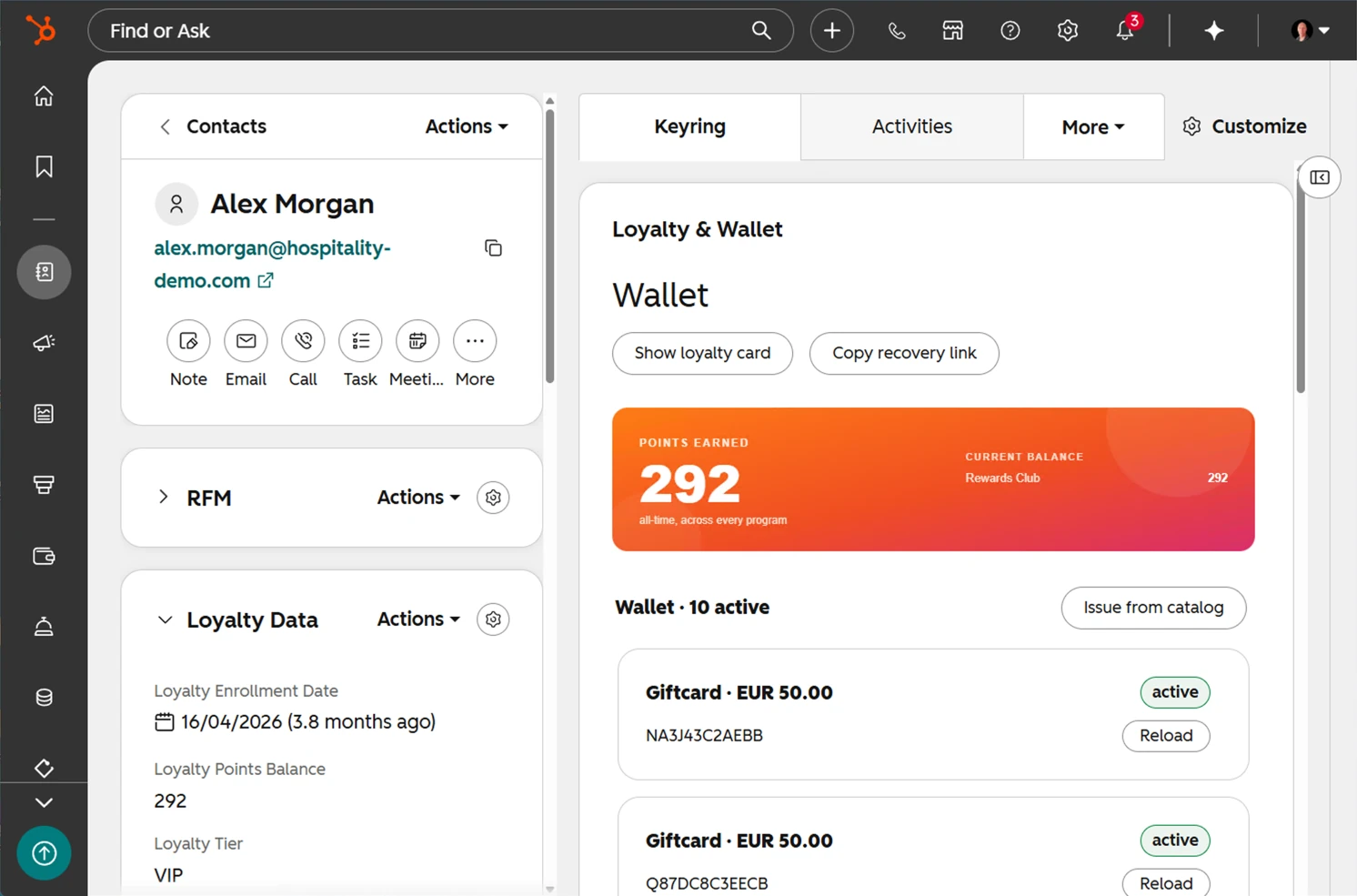 The Keyring tab on a HubSpot contact record: total points earned across programmes, a Rewards Club balance, and a wallet of ten active items including gift cards with their codes and a reload button on each. The record's own sidebar carries loyalty enrolment date, points balance and tier as ordinary contact properties.