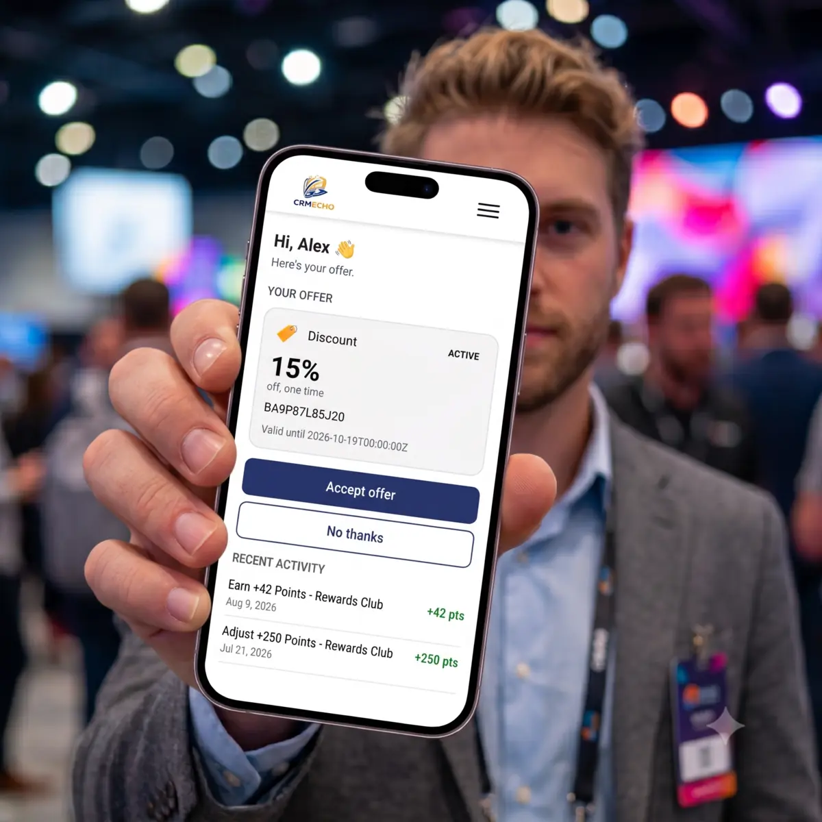 A customer holding their phone, showing an offer in the Keyring wallet: a greeting by name, a percentage-discount card with its code and expiry date, buttons to accept or decline it, and a list of recent points activity beneath.
